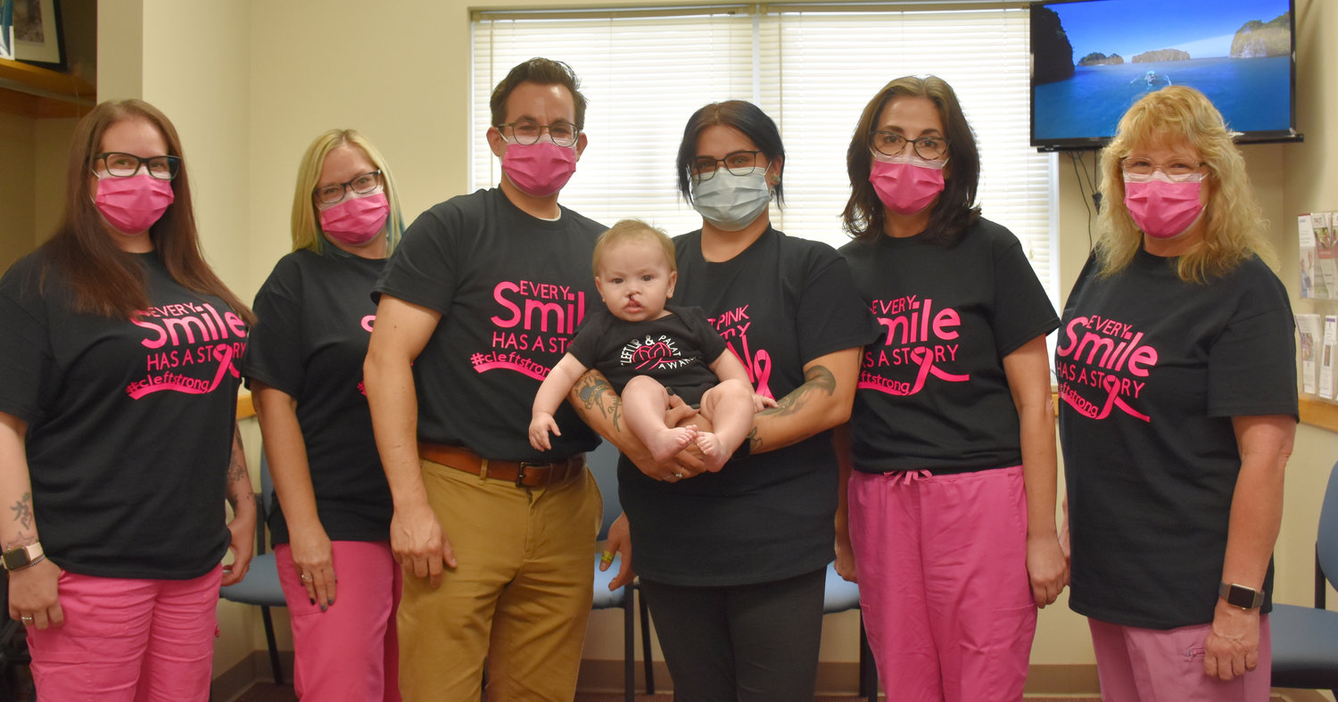 Promoting Cleft Lip and Cleft Palate Awareness Month are staff members of the Waymart Family Health Center with seven-month-old Hunter and his mom, Desiree. Pictured are Melissa Rotella, left; Sally DeGori; Dr. T. J. Luma; Desiree with Hunter; Marci Kowalewski and Kelly Hoherchak.